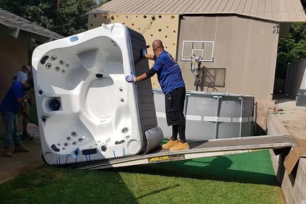 best way to move a large hot tub