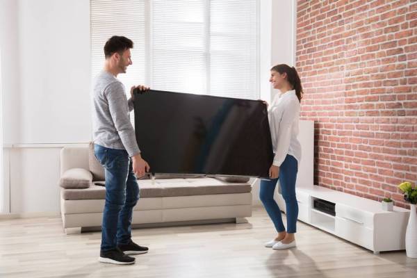 best way to move a large TV